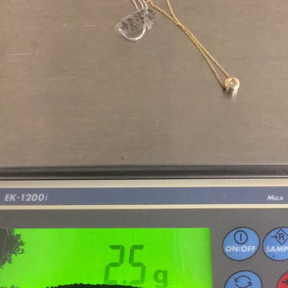 14k yellow gold round diamond pendant. - Picture 3 of 4